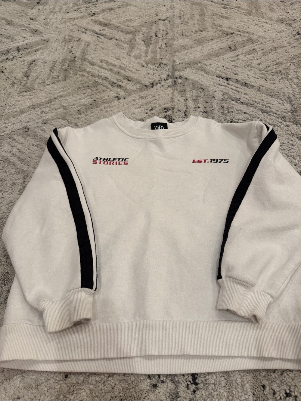 Zara White Crewneck Sweater with Black Sleeve Stripes and Red Text